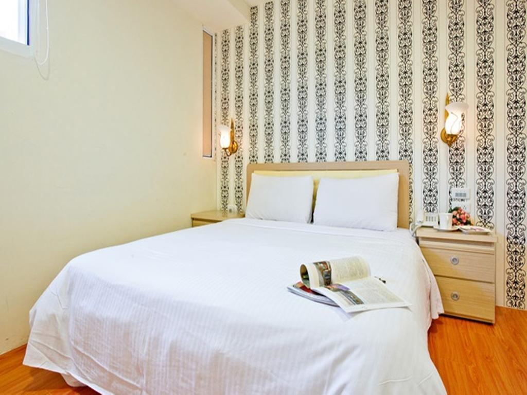 Green Park Commercial Hotel Tchaj-nan Pokoj fotografie