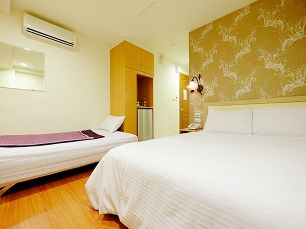 Green Park Commercial Hotel Tchaj-nan Pokoj fotografie